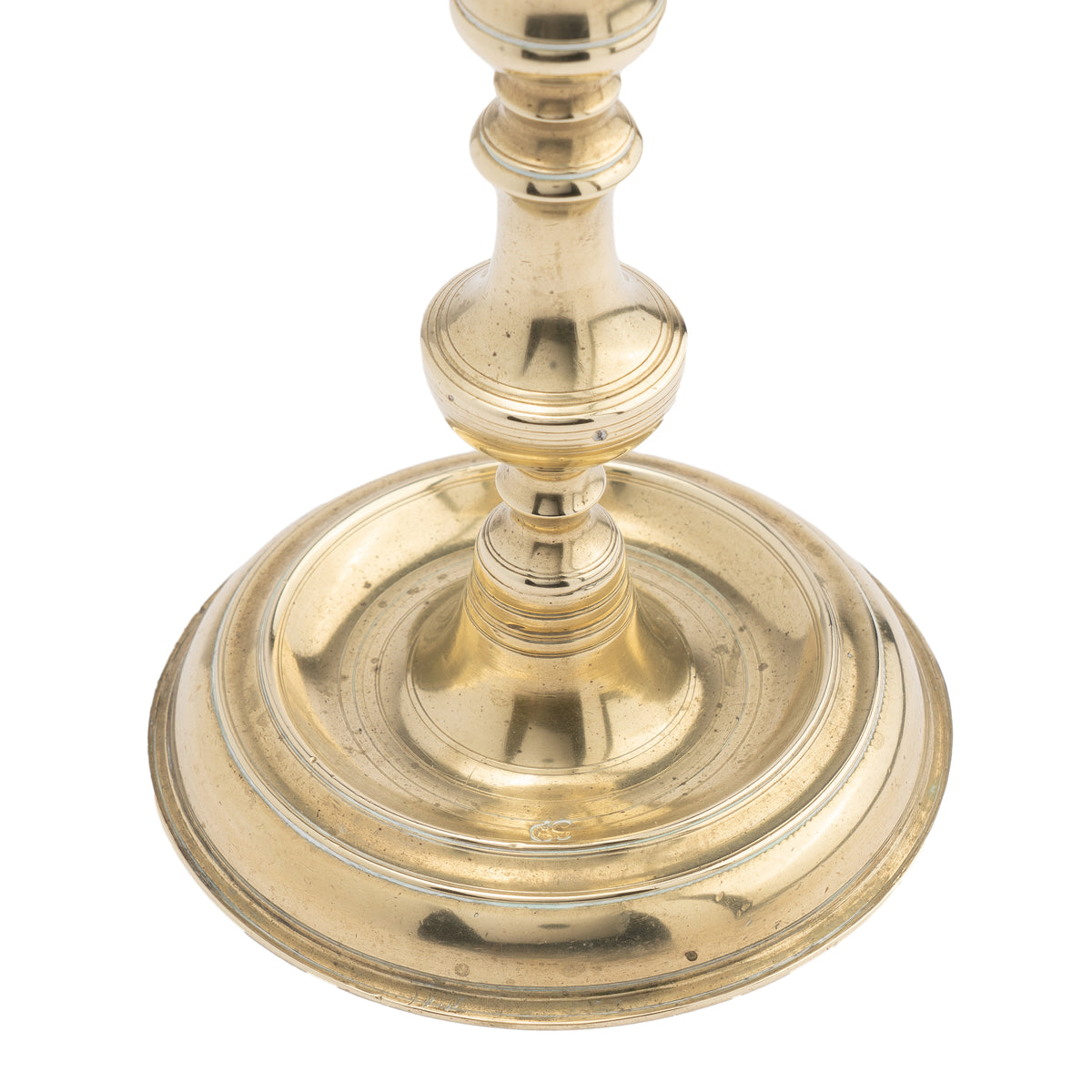 Assembled pair of French Louis XV cast brass chamber candlesticks, 1710-20