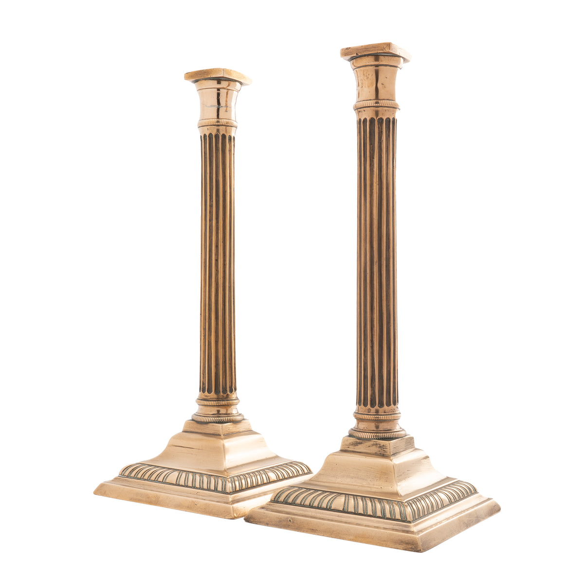 Pair of English cast bell metal candlesticks, 1790