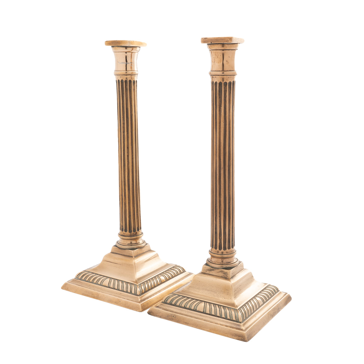 Pair of English cast bell metal candlesticks, 1790