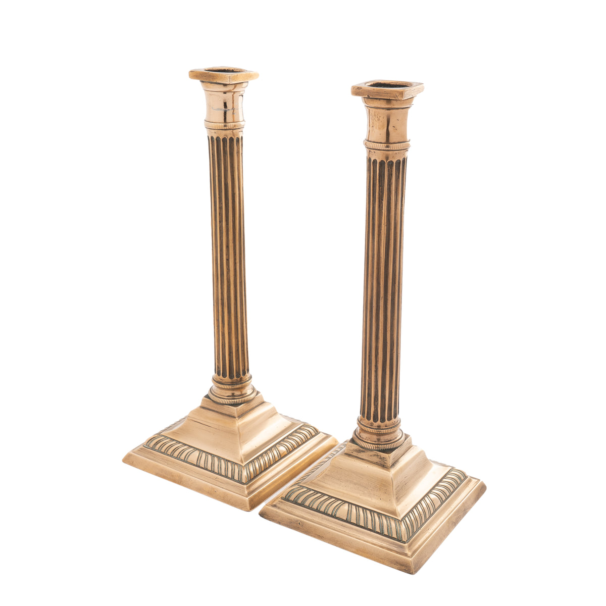Pair of English cast bell metal candlesticks, 1790