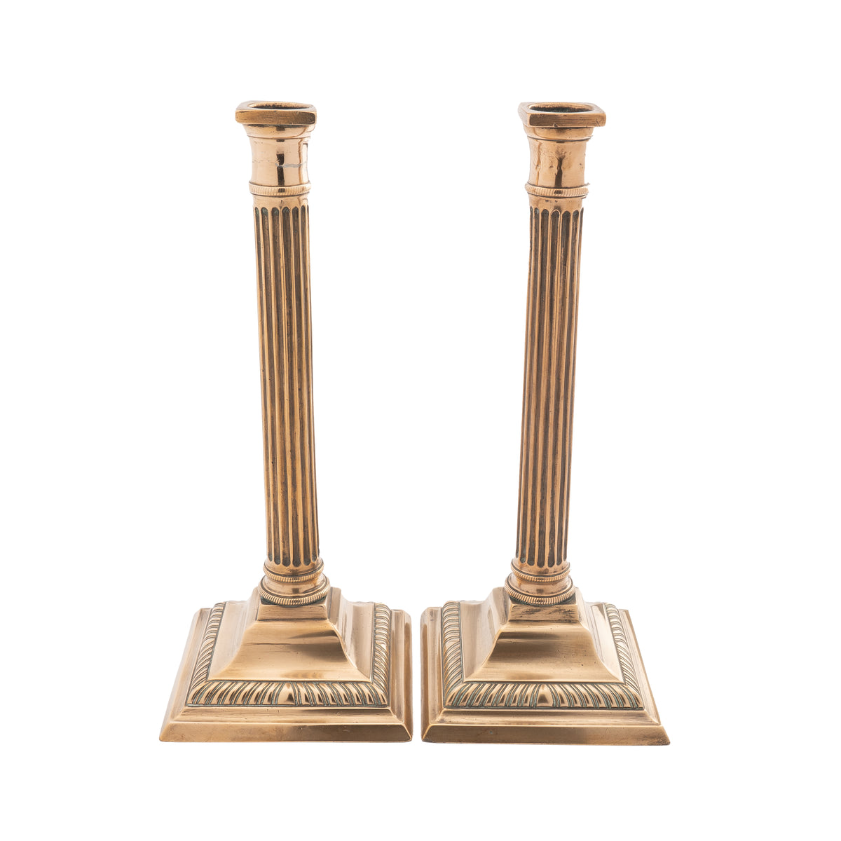 Pair of English cast bell metal candlesticks, 1790