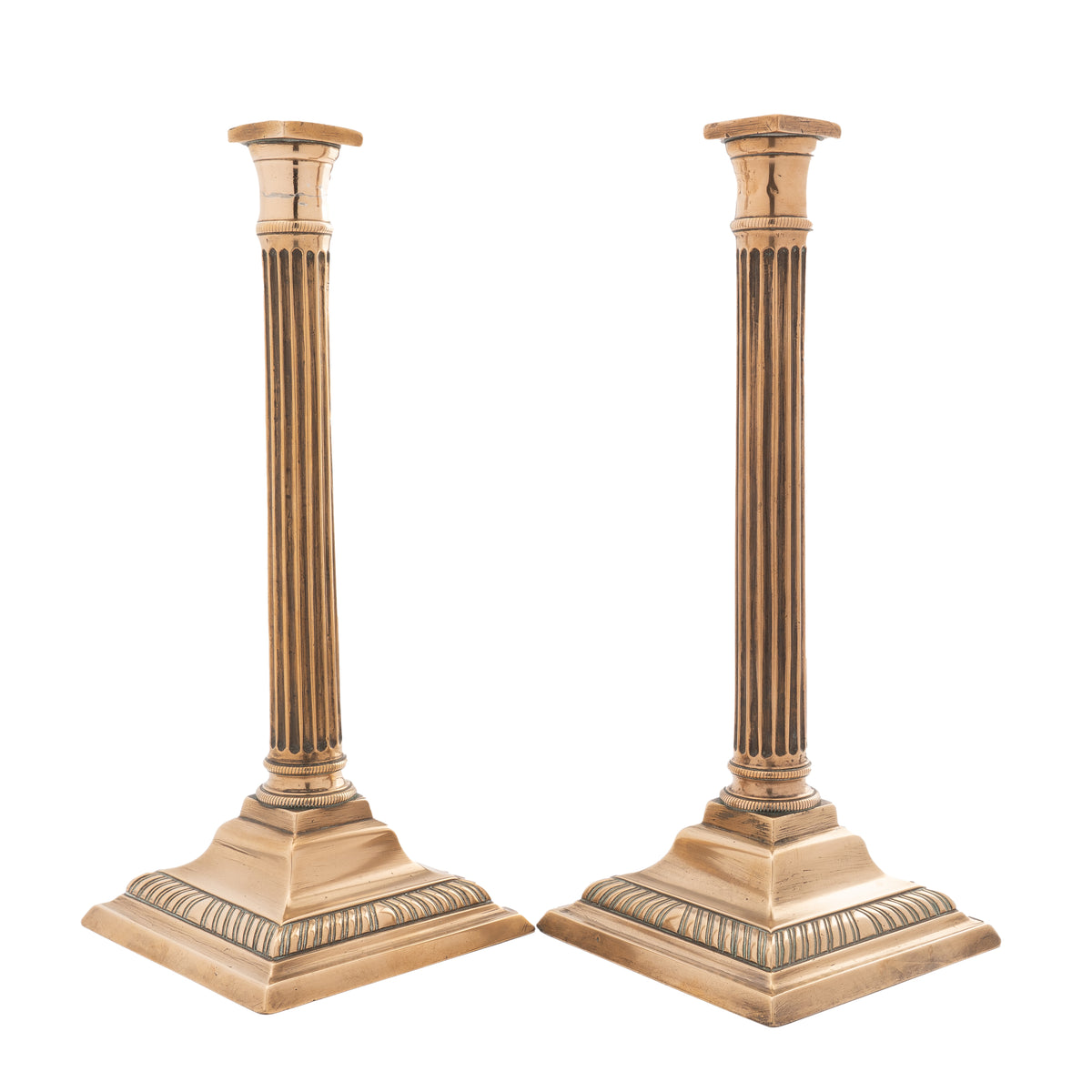Pair of English cast bell metal candlesticks, 1790