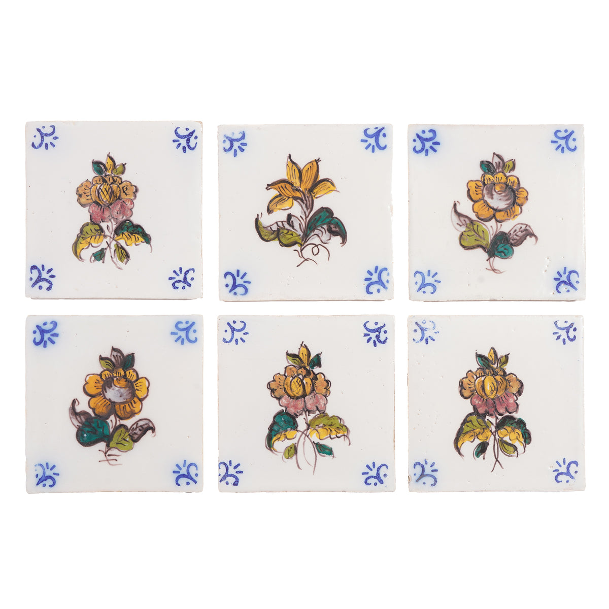 Set of 6 Portuguese hand painted botanical faience tiles in the Dutch taste, 1995