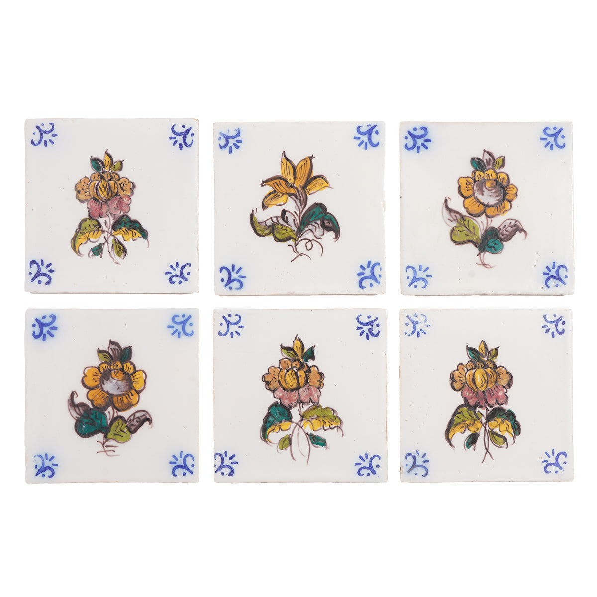 Set of 6 Portuguese hand painted botanical faience tiles in the Dutch taste, 1995