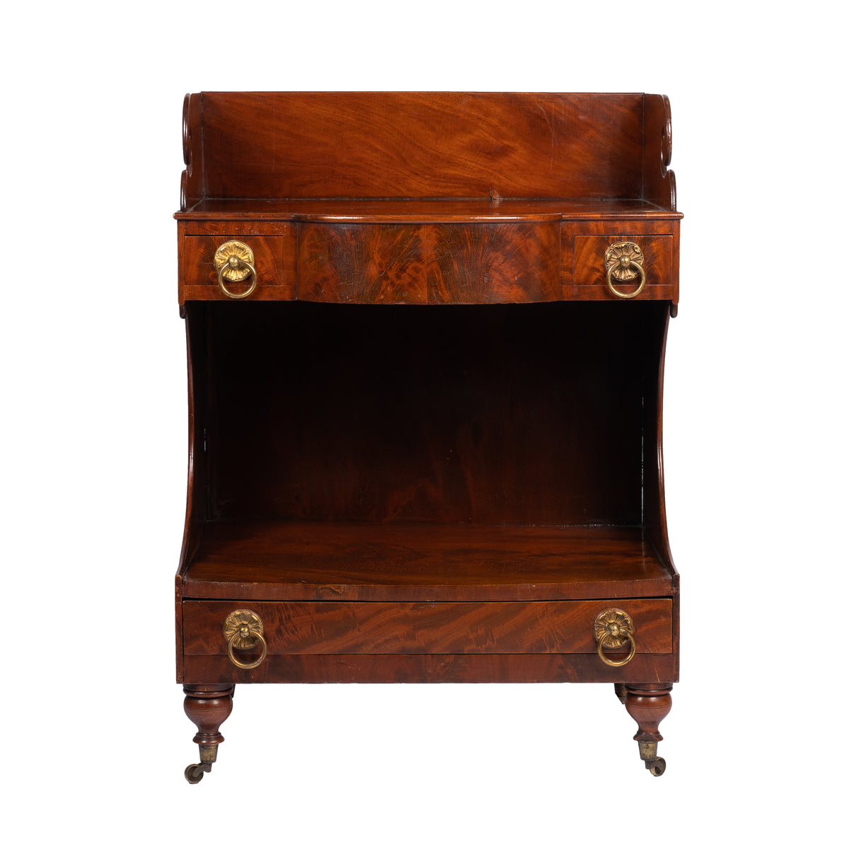 American mahogany demilune dressing stand on brass castors, 1830s