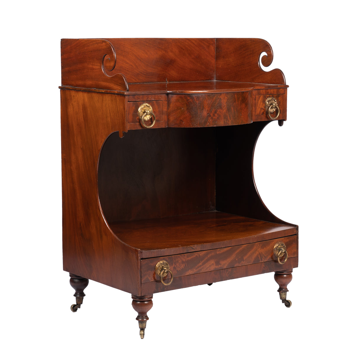 American mahogany demilune dressing stand on brass castors, 1830s