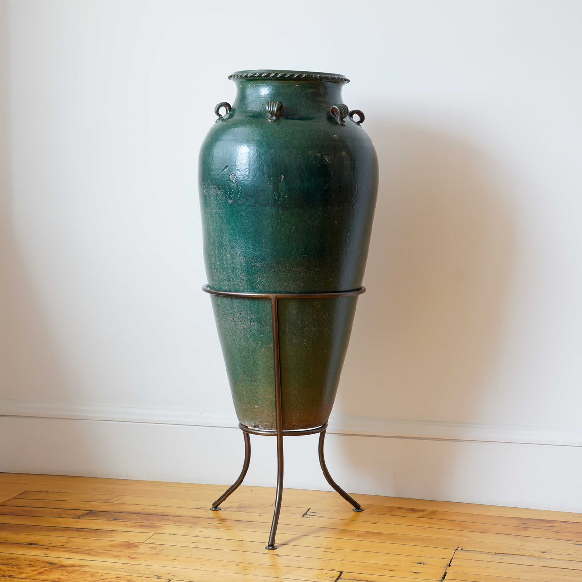 Large Mediterranean green glazed terra-cotta grain jar on stand, 19th century