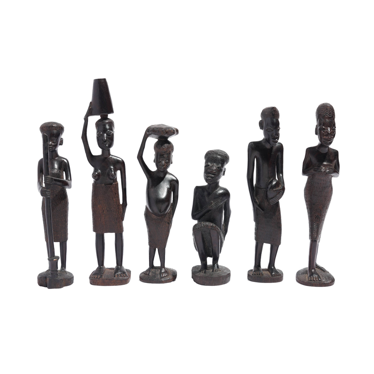 Carved Kenyan ebony village figures, set of six, 1950-70