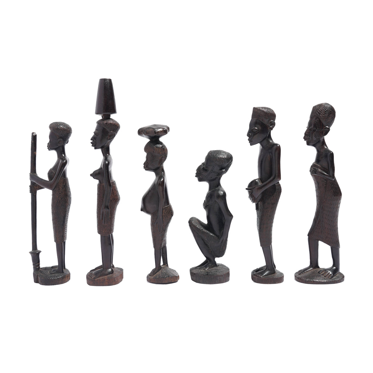 Carved Kenyan ebony village figures, set of six, 1950-70