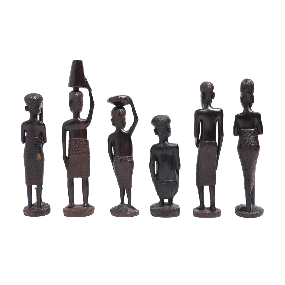 Carved Kenyan ebony village figures, set of six, 1950-70